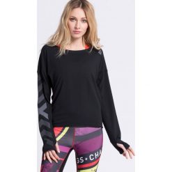 Reebok - Bluza. Czarne bluzy damskie Reebok, l, bez wzorów, z poliesteru, z kapturem. W wyprzedaży za 189.90 zł.