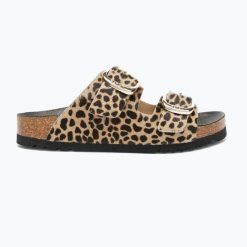 Klapki damskie Scholl Noelle Pony Leather. Brązowe klapki damskie Scholl, na lato, bez wzorów, z materiału, bez obcasa, bez zapięcia. Za 634.50 zł.