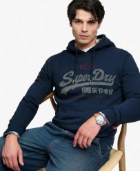Superdry Bluza z kapturem Vintage Logo Heritage Relaxed Deep Sea Blue Marl. Niebieskie bluzy damskie Superdry, m, bez wzorów, z materiału, klasyczne, bez ramiączek, z kapturem. Za 385.65 zł.