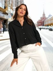 Koszula - czarny. Czarne koszule damskie Sinsay, l, bez wzorów, ze skóry, bez kołnierzyka, bez ramiączek. Za 49.99 zł.