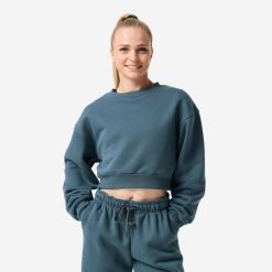 Bluza fitness damska Domyos crop. Niebieskie bluzy damskie DOMYOS, l, bez wzorów, z bawełny, klasyczne, bez ramiączek, bez kaptura. Za 129.99 zł.