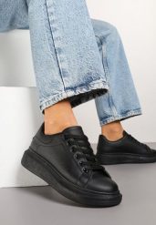 Czarne Sneakersy Tenisówki na Grubej Piankowej Podeszwie Elorila. Czarne trampki i tenisówki damskie Born2be, z aplikacjami, z jeansu, bez zapięcia. Za 59.99 zł.