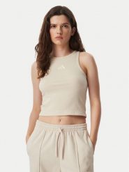 Adidas Top Kit Small Logo Rib Tank KS7834 Kremowy Slim Fit. Białe topy damskie Adidas, xs, bez wzorów, z bawełny, bez kołnierzyka, bez ramiączek. Za 129.99 zł.