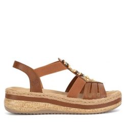 Sandały Rieker. Brązowe sandały damskie Rieker, bez wzorów, bez obcasa, na koturnie, bez zapięcia. Za 329.99 zł.