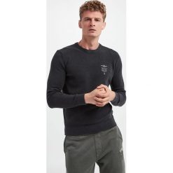 Sweter męski AERONAUTICA MILITARE. Swetry męskie Aeronautica Militare, m, bez wzorów, bez kołnierzyka, bez ramiączek. W wyprzedaży za 441.75 zł.