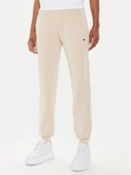 Guess Spodnie dresowe V4YB08 KCAY2 Beżowy Regular Fit. Brązowe spodnie dresowe damskie Guess, z aplikacjami, z dresówki. Za 259.99 zł.