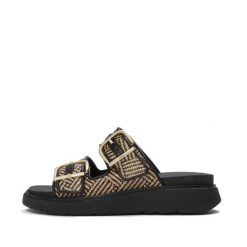 Klapki na koturnie z klamrą damskie FitFlop Gen-FF. Czarne klapki damskie FIT FLOP, bez wzorów, ze splotem, wakacyjne, bez obcasa, na koturnie, bez zapięcia. Za 678.50 zł.