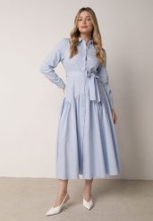 Niebieska Koszulowa Sukienka z Bawełną i Wiskozą Ozdobiona Paskiem Viviedah. Niebieskie sukienki damskie Born2be, na co dzień, l, bez wzorów, z bawełny, bez kołnierzyka, bez ramiączek, maxi, koszulowe. Za 199.99 zł.