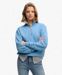 Superdry Sweter z półzamkiem Essential Logo z bawełnianej mieszanki. Niebieskie swetry męskie Superdry, bez wzorów, z bawełny, bez kołnierzyka, bez ramiączek. Za 279.65 zł.