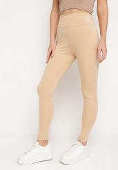 Beżowe Legginsy z Wysokim Stanem i Gumką w Pasie Bloelia. Brązowe legginsy damskie Born2be, bez wzorów, z jeansu. Za 29.99 zł.