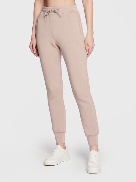 Guess Spodnie dresowe Allie Scuba V2YB18 K7UW2 Beżowy Regular Fit. Brązowe spodnie dresowe damskie Guess, z aplikacjami, z dresówki. Za 365.00 zł.
