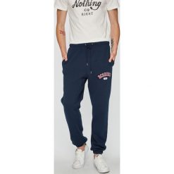 DC - Spodnie. Niebieskie spodnie materiałowe męskie DC, bez wzorów, z bawełny. W wyprzedaży za 179.90 zł.