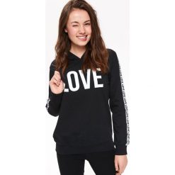 BLUZA NIEROZPINANA DAMSKA, Z KAPTUREM. Czarne bluzy damskie TROLL, na jesień, s, bez wzorów, z dzianiny, bez ramiączek, z kapturem. W wyprzedaży za 59.99 zł.