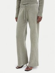 Juicy Couture Spodnie dresowe JCWEB006 Khaki Regular Fit. Brązowe spodnie dresowe damskie Juicy Couture, bez wzorów, z dresówki. Za 549.99 zł.