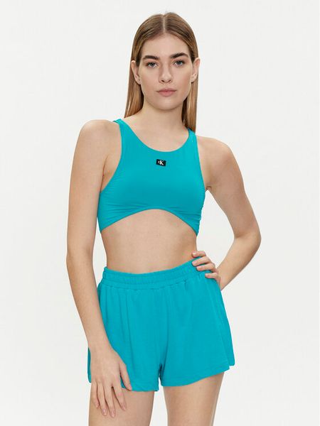 Calvin Klein Swimwear Góra od bikini KW0KW02442 Niebieski. Niebieskie bikini Calvin Klein Swimwear, bez wzorów, z syntetyku. Za 129.99 zł.