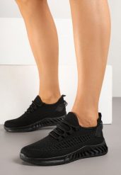 Czarne Buty Sportowe Sneakersy z Siateczkowego Materiału na Tłoczonej Podeszwie Ralloti. Czarne obuwie sportowe damskie Born2be, bez wzorów, z jeansu, z okrągłym noskiem, bez zapięcia, trekkingowe. Za 69.99 zł.