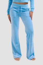 JUICY COUTURE Błękitne spodnie dresowe Del Ray Pocketed Pant. Niebieskie spodnie dresowe damskie Juicy Couture, bez wzorów, z dresówki. W wyprzedaży za 337.99 zł.