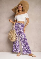 Fioletowe Spodnie High Waist z Wiskozy w Kwiaty z Szerokimi Nogawkami i Gumką w Pasie Gronea. Fioletowe spodnie materiałowe damskie Renee, bez wzorów, z jeansu, z podwyższonym stanem. Za 49.99 zł.