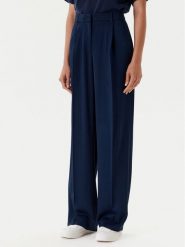 Tommy Hilfiger Spodnie materiałowe WW0WW46749 Granatowy Relaxed Fit. Niebieskie spodnie materiałowe damskie Tommy Hilfiger, bez wzorów, z materiału. Za 489.99 zł.