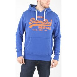 SuperDry Bluza Niebieski. Niebieskie bluzy męskie Superdry, xl, bez wzorów, z bawełny, bez ramiączek, bez kaptura. Za 395.95 zł.