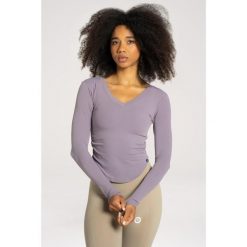 Koszulka fitness damska Gym Glamour wycięta z długimi rękawami. Niebieskie bluzki damskie GYM GLAMOUR, m, bez wzorów, glamour, bez kołnierzyka, bez ramiączek. Za 149.99 zł.