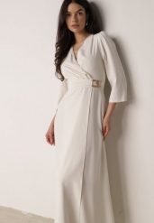 Jasnobeżowa Kopertowa Sukienka Wieczorowa z Metaliczną Aplikacją w Talii Henalana. Brązowe sukienki damskie Born2be, na imprezę, l, z aplikacjami, eleganckie, bez kołnierzyka, bez ramiączek, maxi, kopertowe. Za 169.99 zł.