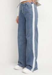 Niebieskie Jeansy o Szerokim Kroju z Gumką w Pasie i Lampasami Nusaria. Niebieskie jeansy damskie Born2be, bez wzorów, z jeansu, eleganckie. Za 109.99 zł.