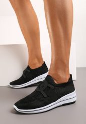 Czarne Buty Sportowe na Koturnie z Elastyczną Cholewką przed Kostkę Vataria. Czarne obuwie sportowe damskie Born2be, bez wzorów, z jeansu, bez zapięcia. Za 54.99 zł.