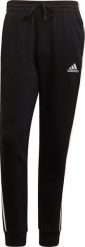 Adidas Spodnie męskie adidas Essentials Fleece czarne GK8821 S. Czarne spodnie sportowe męskie Adidas, m, bez wzorów. Za 182.12 zł.