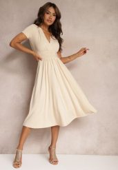 Beżowa Sukienka Taliowana z Kopertowym Dekoltem o Rozkloszowanym Kroju Rimadea. Brązowe sukienki damskie Renee, l, bez wzorów, eleganckie, bez kołnierzyka, bez ramiączek, midi, kopertowe. Za 119.99 zł.