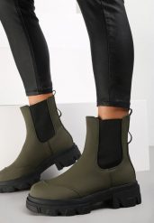 Zielone Botki Rhodima. Zielone botki damskie Renee, bez wzorów, z nubiku, przed kolano, bez obcasa, na płaskiej podeszwie, bez zapięcia. Za 64.99 zł.