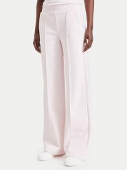 Guess Spodnie dresowe V6BB18 K6353 Różowy jasny Regular Fit. Czerwone spodnie dresowe damskie Guess, z aplikacjami, z dresówki. Za 394.99 zł.