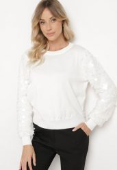 Biały Sweter z Wiskozą o Klasycznym Kroju z Cekinowymi Rękawami Evandreth. Białe swetry nierozpinane damskie Born2be, bez wzorów, z jeansu, eleganckie, bez kołnierzyka, bez ramiączek. Za 119.99 zł.