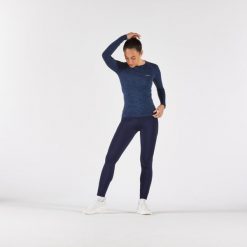 Legginsy do biegania damskie Kiprun Run 500 Warm ocieplane. Niebieskie legginsy damskie KIPRUN, bez wzorów, z elastanu. Za 139.99 zł.