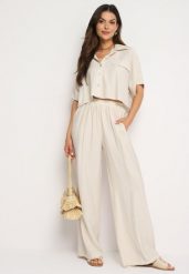 Beżowy Wiskozowy Komplet 2-Częściowy Luźna Koszula Spodnie z Szerokimi Nogawkami Ulvitela. Brązowe koszule damskie Born2be, bez wzorów, z wiskozy, eleganckie, bez kołnierzyka, bez ramiączek. Za 149.99 zł.