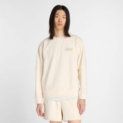 Bluza męska New Balance MT41547PEF – beżowa. Brązowe bluzy męskie New Balance, m, bez wzorów, z bawełny, klasyczne, bez ramiączek, bez kaptura. Za 359.99 zł.