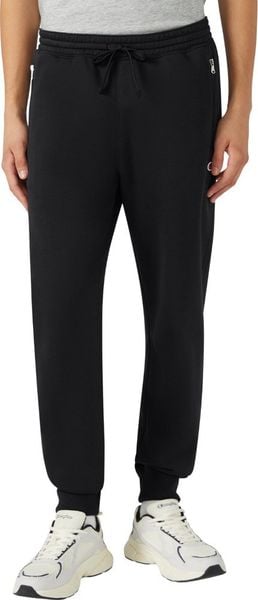 Champion Spodnie męskie dresowe Rib Cuff Pants czarne 220300 KK001 2XL. Czarne spodnie sportowe męskie Champion, m, bez wzorów, z dresówki. Za 270.80 zł.