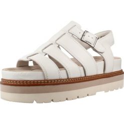 Sandały CLARKS ORIANNA TWIST Biały. Białe sandały damskie Clarks, bez wzorów, ze skóry, bez obcasa, bez zapięcia. Za 279.99 zł.