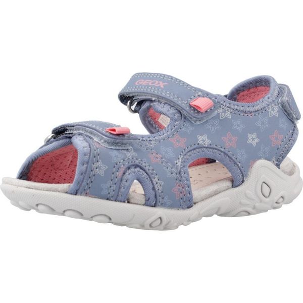 Sandały GEOX J SANDAL WHINBERRY G Niebieski. Niebieskie sandały damskie Geox, na lato, bez wzorów, z syntetyku, bez zapięcia. Za 189.99 zł.