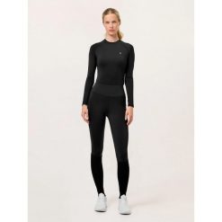 Damskie legginsy jeździeckie z pełną przyczepnością Equestrian Stockholm Jump Mo. Czarne legginsy damskie EQUESTRIAN STOCKHOLM, bez wzorów. Za 435.50 zł.
