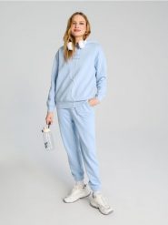 Bluza hoodie - błękitny. Niebieskie bluzy damskie Sinsay, l, bez wzorów, bez ramiączek, bez kaptura. W wyprzedaży za 19.99 zł.