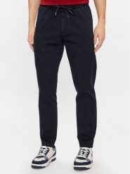 Tommy Hilfiger Chinosy Chelsea MW0MW33918 Granatowy Slim Fit. Niebieskie eleganckie spodnie męskie Tommy Hilfiger, bez wzorów, z bawełny. Za 699.99 zł.