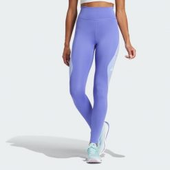 Legginsy Own The Run Colorblock Full-Length. Niebieskie legginsy damskie Adidas, bez wzorów, z elastanu. Za 308.60 zł.