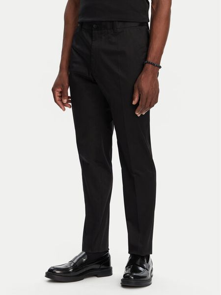 Dolce&Gabbana Spodnie materiałowe GY6IET GI434 N0000 Czarny Regular Fit. Czarne spodnie materiałowe męskie Dolce&Gabbana, bez wzorów, z bawełny. Za 2,549.00 zł.