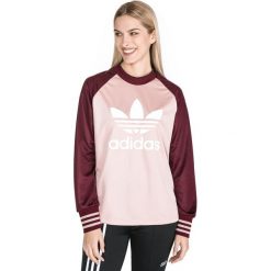 Adidas Originals Koszulka Czerwony Różowy. Czerwone bluzki damskie adidas Originals, bez wzorów, z materiału, bez kołnierzyka, bez ramiączek. Za 163.95 zł.