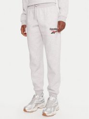 Reebok Spodnie dresowe Stacey RK25166CCW Szary Regular Fit. Szare spodnie dresowe damskie Reebok, bez wzorów, z bawełny. Za 199.99 zł.