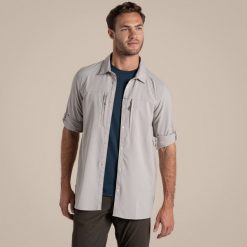 Koszula podróżnicza męska Craghoppers NosiLife Pro LS Shirt V. Białe koszule męskie Craghoppers, m, bez wzorów, casualowe, bez kołnierzyka, bez ramiączek. Za 469.69 zł.