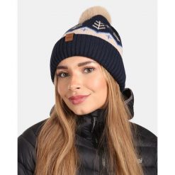 Damska czapka zimowa Kilpi CARMEN-W. Niebieskie czapki damskie Kilpi, na zimę, bez wzorów, z wełny, sportowe. Za 60.57 zł.