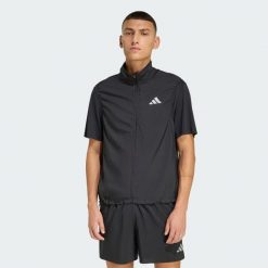 Kurtka bez rękawów adidas Essentials. Czarne kurtki męskie Adidas, bez wzorów, klasyczne, bez kaptura. Za 219.00 zł.