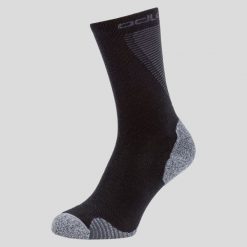 Skarpety Active Warm ODLO. Czarne skarpetki damskie ODLO, bez wzorów, z materiału. Za 99.65 zł.